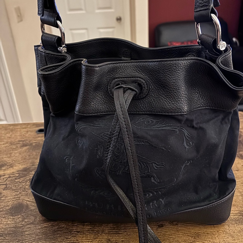 Burberry linen & leather drawstring Bag.  Nova check lining. Good condition.